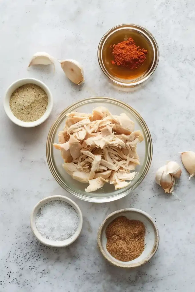 Crockpot shredded chicken taco filling made with low sodium ingredients, ideal for meal prep and easy dinners.