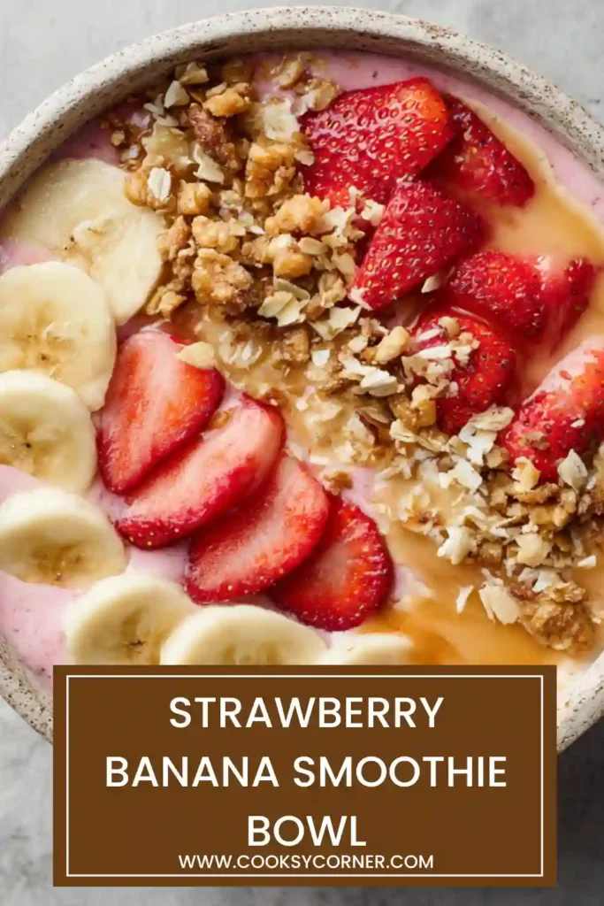 Healthy strawberry banana smoothie bowl with sliced bananas, strawberries, and crunchy toppings. A vibrant and colorful breakfast option.