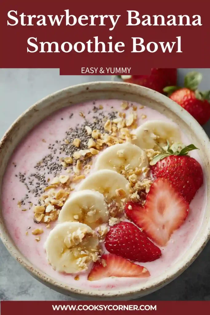 Creamy smoothie bowl with strawberries and banana blended smooth and topped with nuts and seeds.