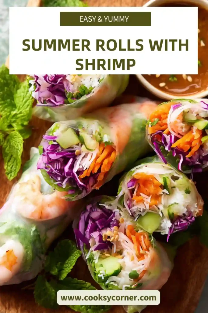 Fresh shrimp summer rolls wrapped in rice paper with visible avocado, carrots, and cabbage.