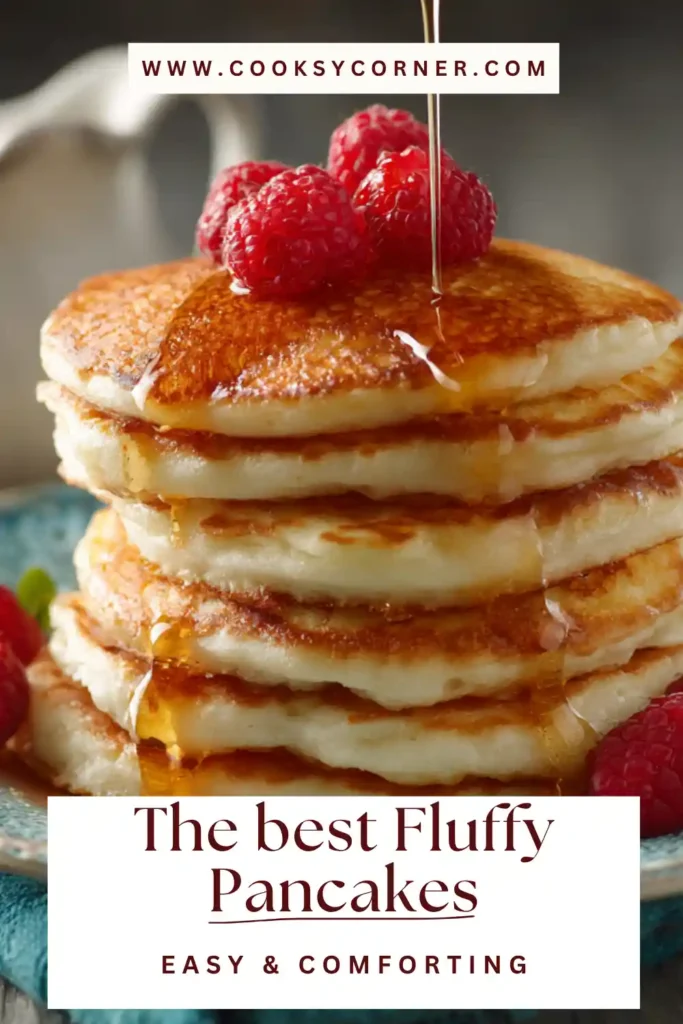 Homemade fluffy pancakes stacked high with golden edges and a light, soft interior ready to serve.