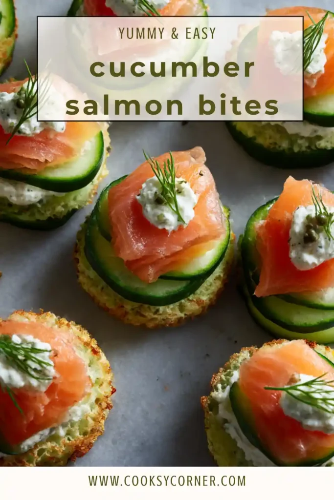 Close-up of cucumber appetizer bites with salmon and black pepper garnish.