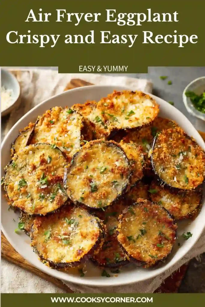 Close-up of breaded Air Fryer Eggplant rounds with a crispy golden crust. Served alongside marinara sauce for dipping and garnished with herbs.