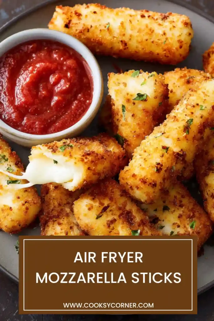 Close-up of freshly cooked Air Fryer Mozzarella Sticks with crunchy golden coating and melted mozzarella cheese. Perfect party snack made in the air fryer.