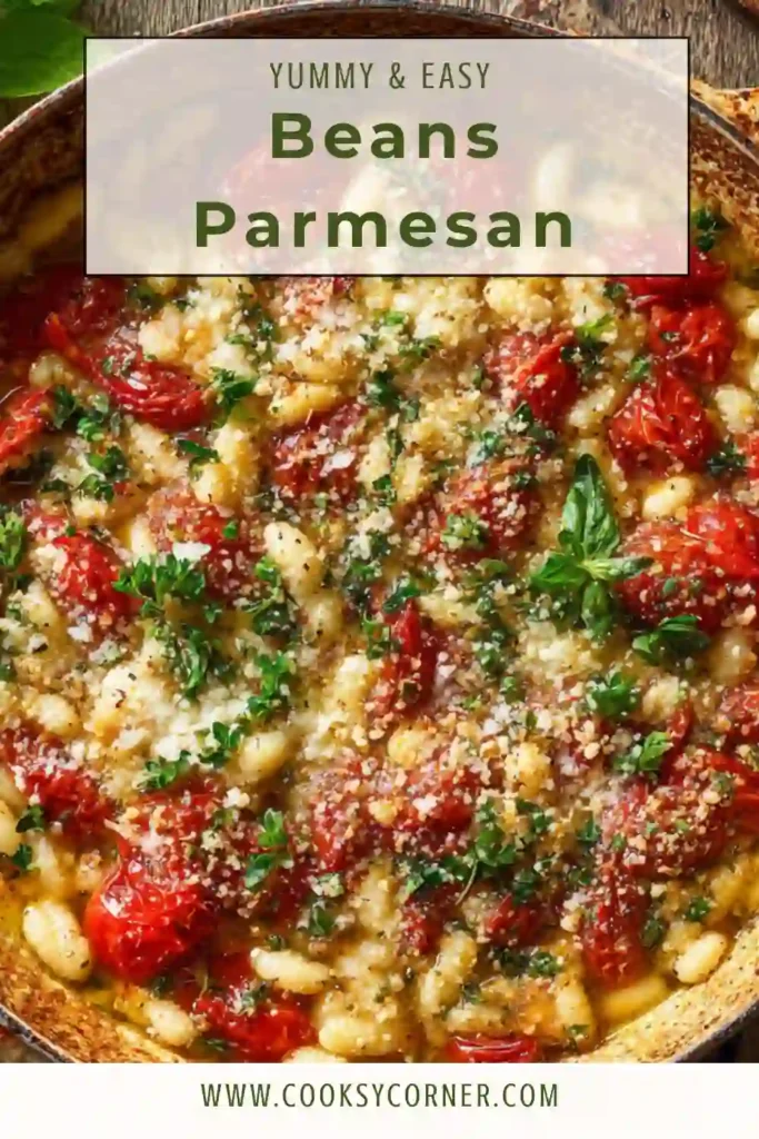 A skillet of Beans Parmesan topped with melted mozzarella, crispy Parmesan breadcrumbs, and fresh basil. This baked cannellini bean recipe looks rich, cheesy, and comforting.