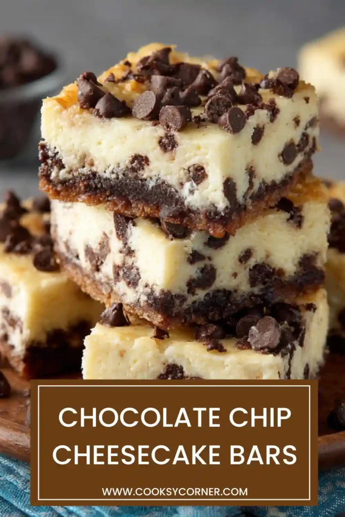 Chocolate Chip Cheesecake Bars sliced into squares with creamy cheesecake filling and mini chocolate chips over a vanilla wafer crust. A rich baked dessert served on parchment paper.