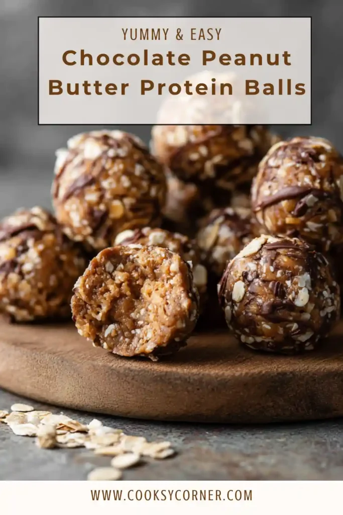 Homemade protein balls stacked in a bowl with visible chocolate chips and oat texture.