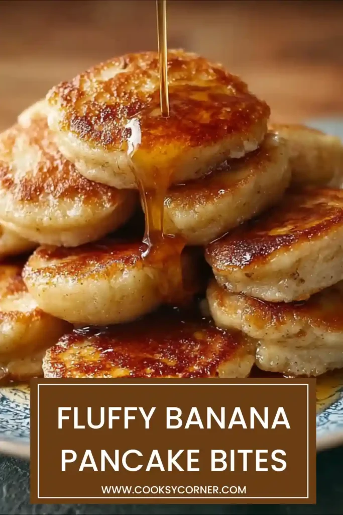 A plate of fluffy banana pancake bites served warm with sliced bananas and maple syrup. These mini banana pancakes have a soft golden texture perfect for breakfast.