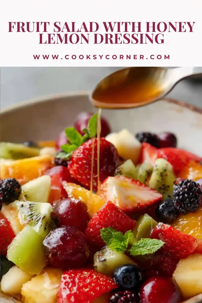 Fresh summer fruit salad with pineapple, mango, strawberries, and blueberries tossed in a light honey lemon dressing. A vibrant and healthy fruit salad recipe served chilled.