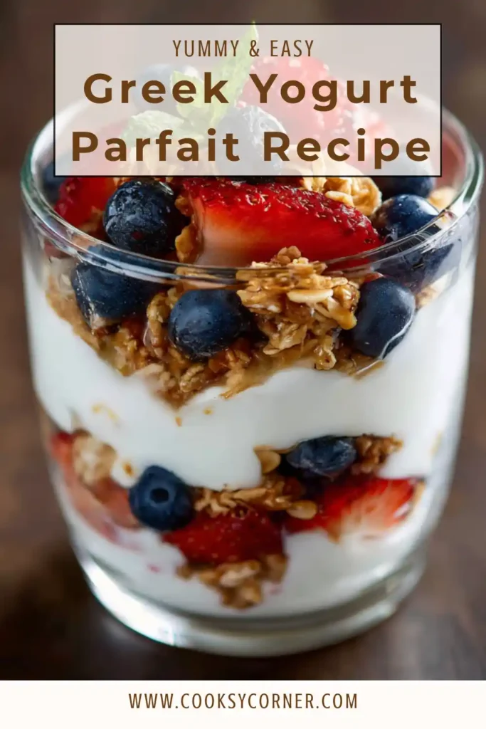 Healthy Greek Yogurt Parfait served in a glass with blueberries, strawberries, granola, and honey. The layered ingredients showcase a nutritious high-protein breakfast.