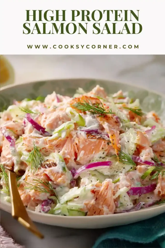 Healthy High-Protein Salmon Salad in a white bowl with crunchy celery and herbs. This low carb salmon salad is ideal for meal prep and healthy lunches.