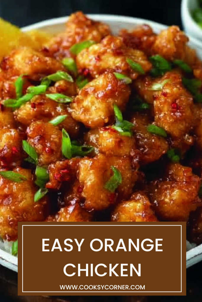 Chinese orange chicken recipe featuring crispy chicken covered in a vibrant orange glaze with fresh citrus flavor and green onion garnish.
