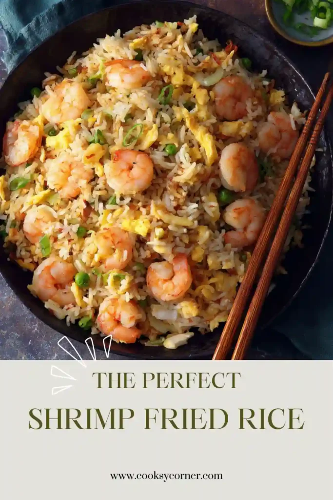Freshly cooked Shrimp Fried Rice served in a bowl with shrimp, eggs, peas, carrots, and green onions. A quick and satisfying seafood fried rice meal.