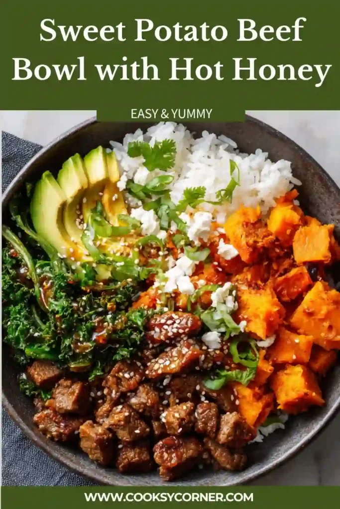 A Sweet Potato Beef Bowl with Hot Honey topped with avocado, black beans, cottage cheese, and shredded cheddar cheese in a serving bowl. The roasted sweet potatoes and seasoned ground beef create a colorful and hearty high-protein meal.