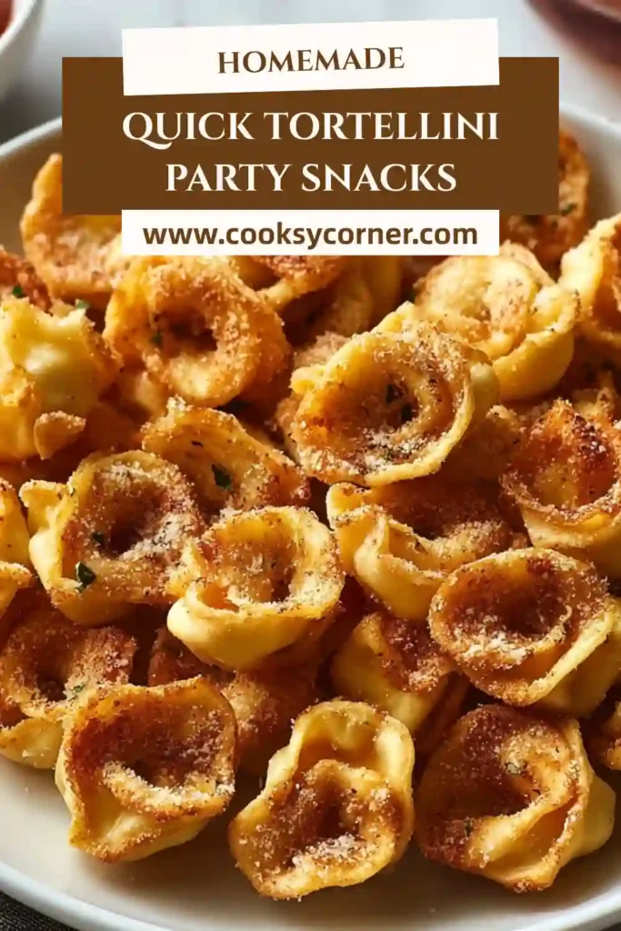 Easy Tortellini Party Snacks fresh from the oven with melted Parmesan and Italian parsley. Cheesy baked tortellini appetizer perfect for parties and gatherings.