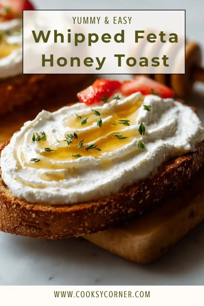 Mediterranean whipped feta honey toast served on a rustic platter with fresh herbs and olive oil.