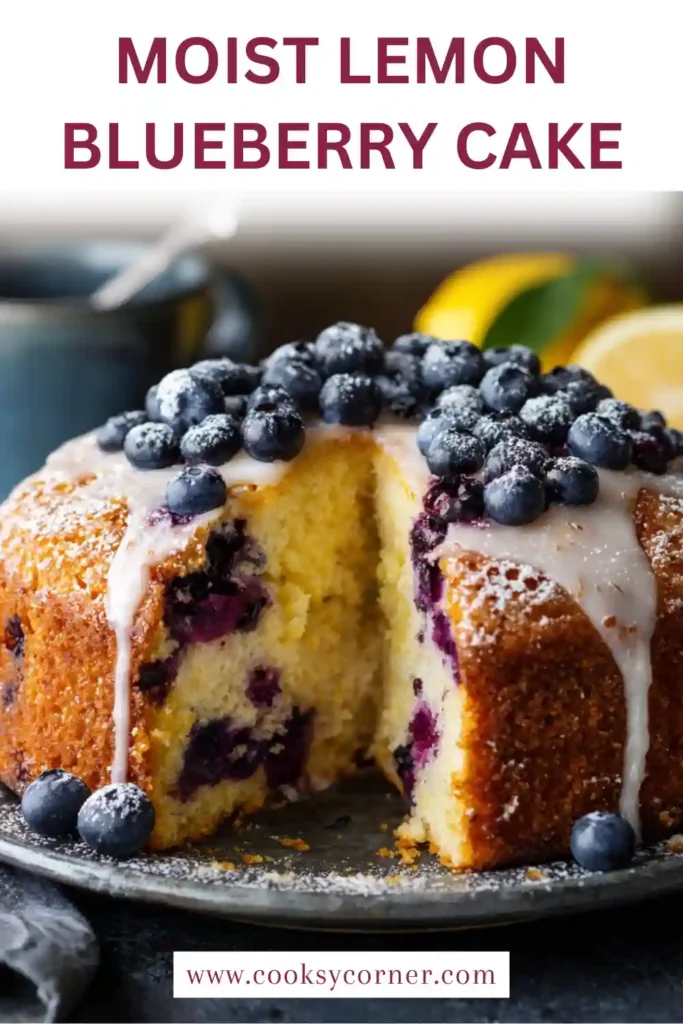 A layered Lemon Blueberry Cake topped with creamy lemon cream cheese frosting and filled with homemade blueberry filling. Fresh blueberries and lemon zest decorate the soft and moist cake.