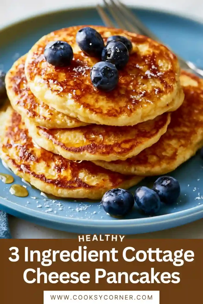 Mini cottage cheese pancakes stacked and drizzled with maple syrup.