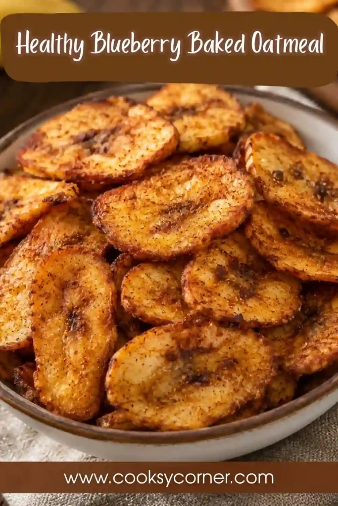 Freshly made banana chips cooked in an air fryer until crisp and served as a healthy homemade snack.
