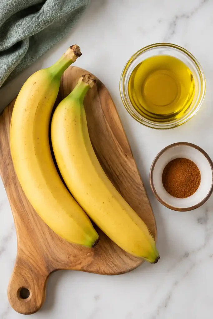 Crunchy Air Fryer Banana Chips served in a ceramic bowl for a healthy vegan snack.