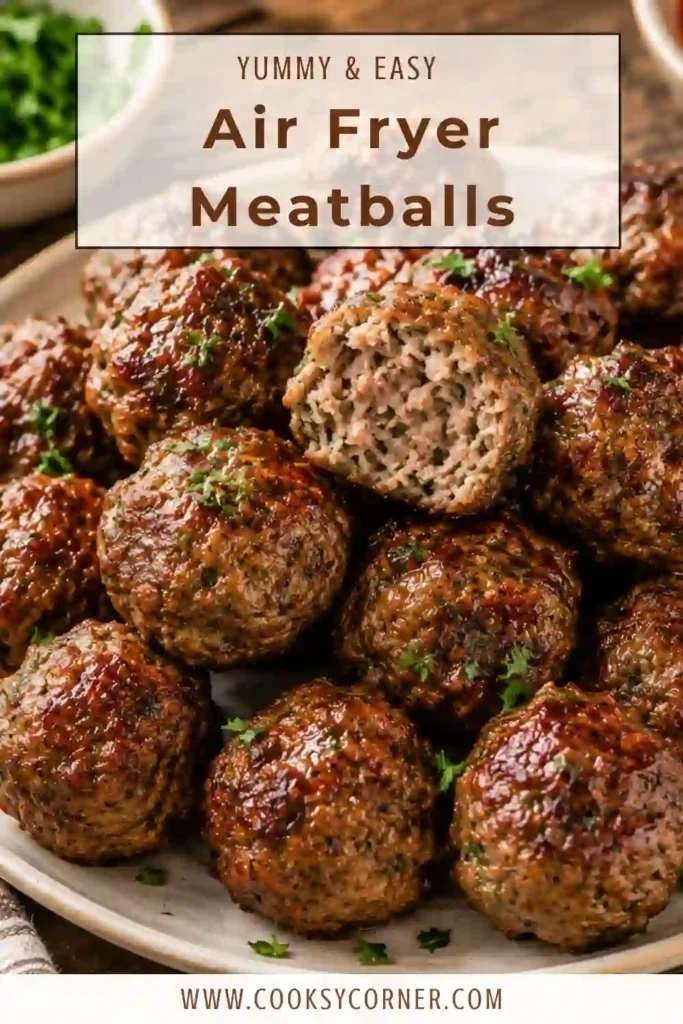A plate of golden brown Air Fryer Meatballs topped with grated Parmesan and chopped parsley. These homemade beef meatballs are juicy, tender, and perfect for an easy family dinner.