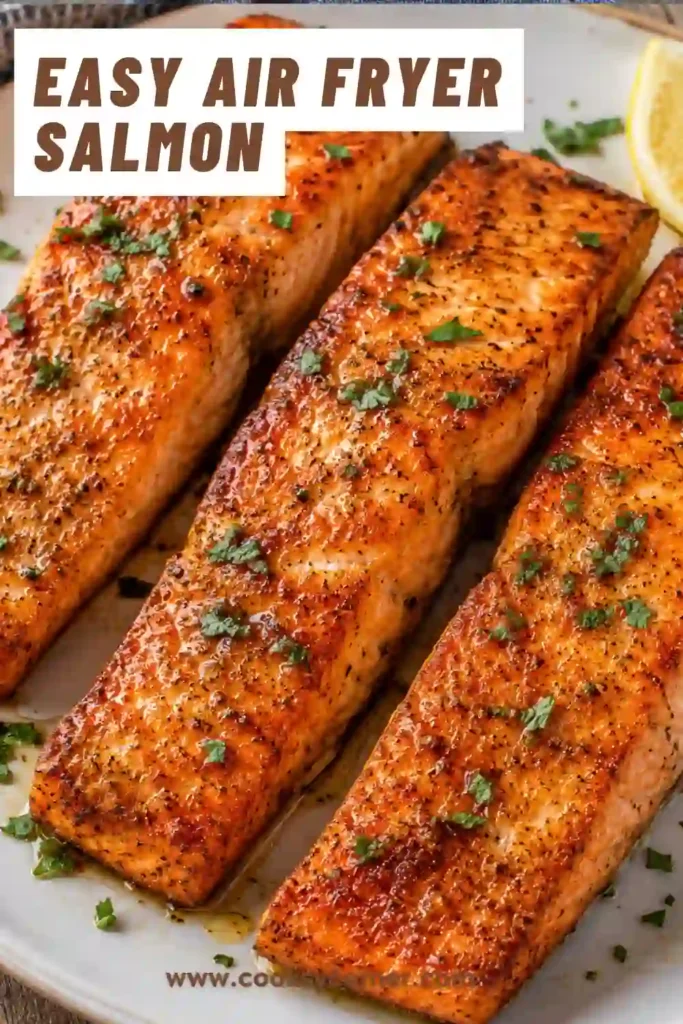 Perfectly cooked Air Fryer Salmon fillets seasoned with paprika, garlic, and onion powder. The salmon is flaky, tender, and served fresh from the air fryer.