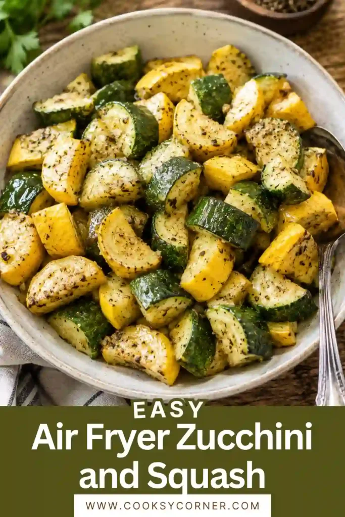 Close-up of crispy Air Fryer Zucchini and Squash tossed with olive oil, garlic powder, and Italian seasoning. A healthy low-carb vegetable recipe for everyday meals.