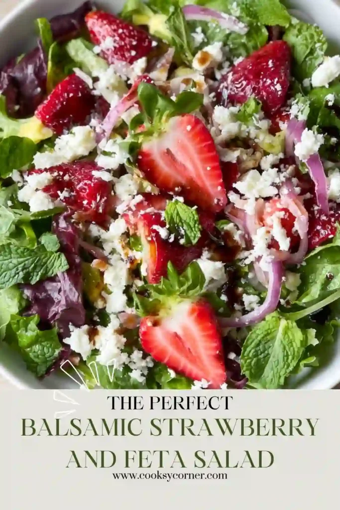 Homemade strawberry feta salad made with baby spinach, shredded red cabbage, avocado, and balsamic vinaigrette. Perfect for a healthy lunch or side dish.