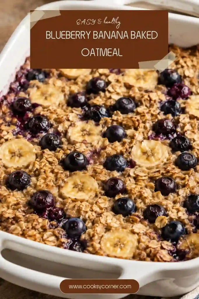 Homemade blueberry banana baked oatmeal in a baking dish with fresh fruit on top.
