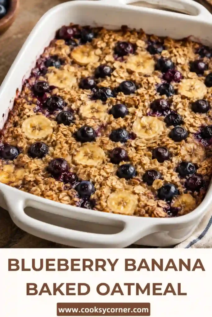 Blueberry Banana Baked Oatmeal sliced into squares and topped with fresh blueberries and banana slices.