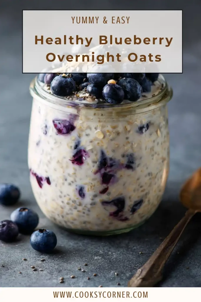 Blueberry oatmeal jars prepared for meal prep and topped with extra blueberries.