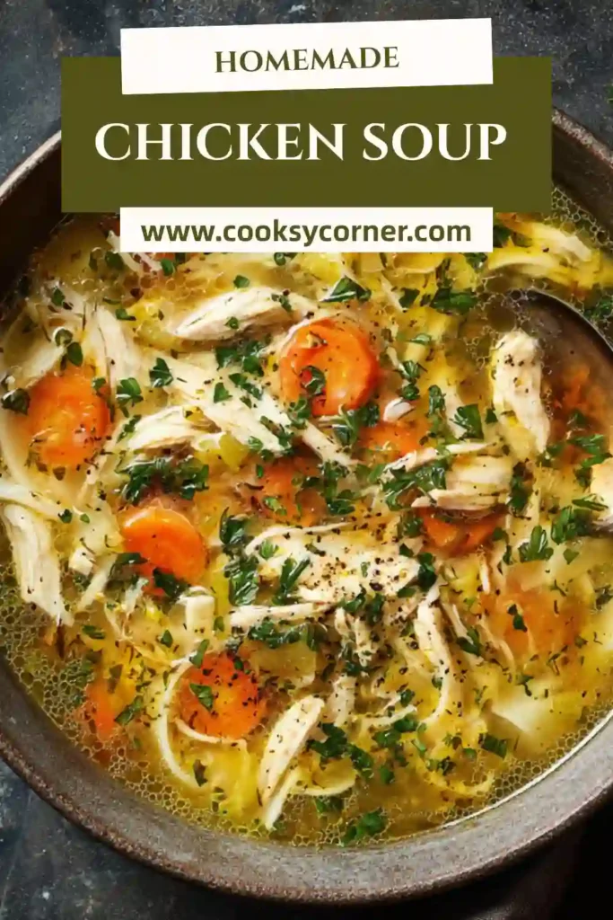 A bowl of homemade chicken soup filled with shredded chicken, carrots, celery, and fresh herbs in a flavorful golden broth. This comforting chicken soup recipe is perfect for family dinners.