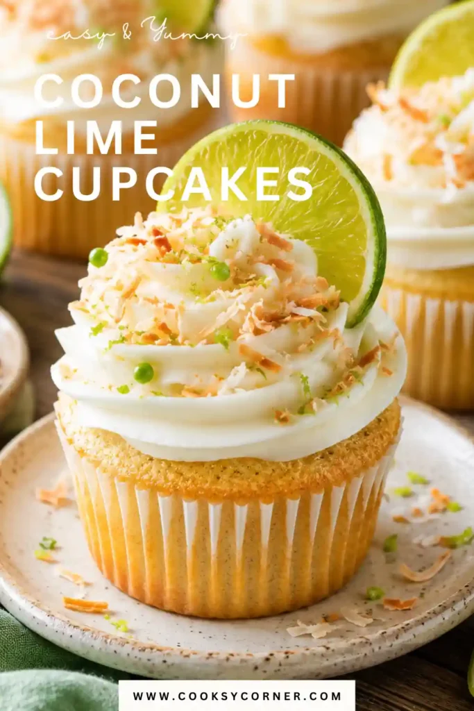 Moist coconut cupcakes with lime frosting arranged on a cake stand. These tropical cupcakes are garnished with fresh lime zest and toasted coconut.