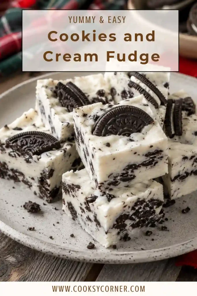 Homemade cookies and cream fudge cut into squares and decorated with cookie pieces. Rich, smooth, and easy to make.