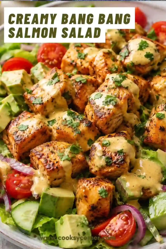 Fresh Bang Bang Salmon Salad with crispy salmon filet and creamy homemade dressing. A vibrant and satisfying healthy dinner recipe.