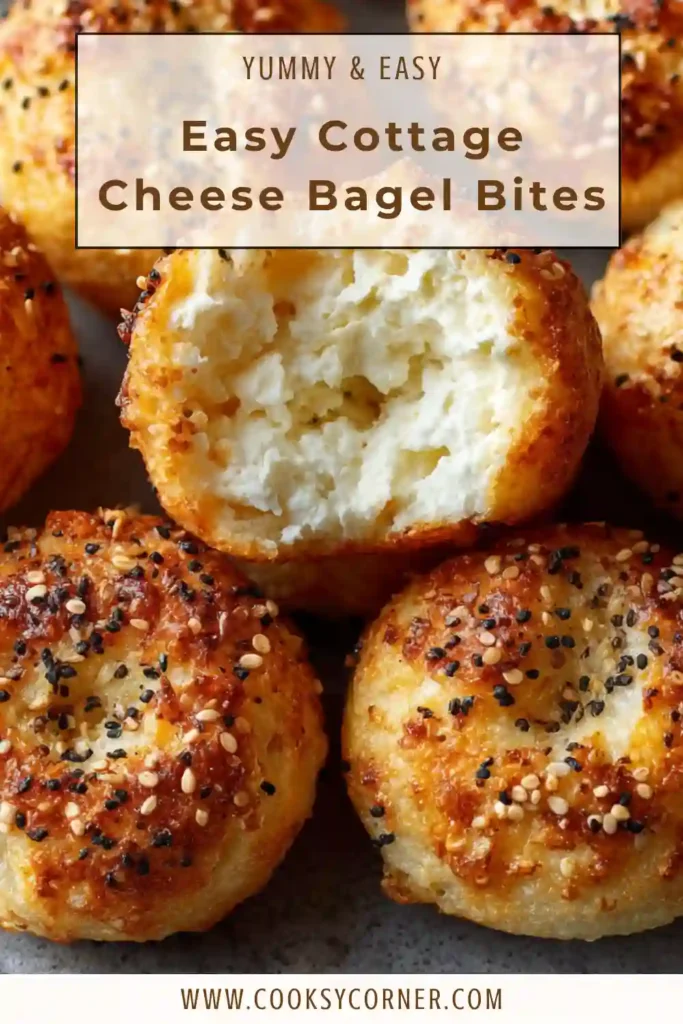 Freshly baked Cottage Cheese Bagel Bites topped with everything bagel seasoning and served on a wooden board.