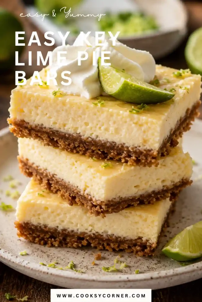 Creamy key lime dessert bars featuring fresh lime zest and whipped cream garnish. Perfect summer dessert with bright citrus flavor.