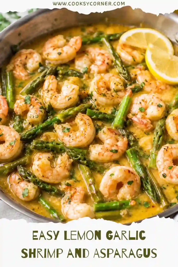 A serving of lemon garlic shrimp with tender asparagus and fresh basil in a rich buttery sauce. The dish is bright, colorful, and perfect for a healthy dinner.