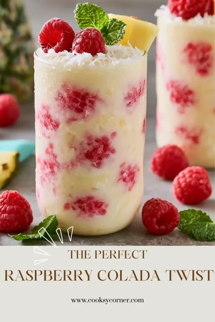 Easy Raspberry Colada Twist Recipe displayed with fresh fruit ingredients and tropical garnishes. The beverage has a vibrant pink color and creamy consistency.
