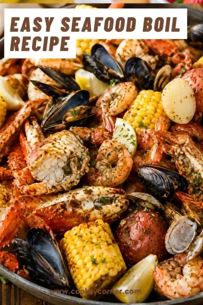 Seafood boil with shrimp, crab legs, mussels, corn, and potatoes served on a large platter with lemon butter sauce.