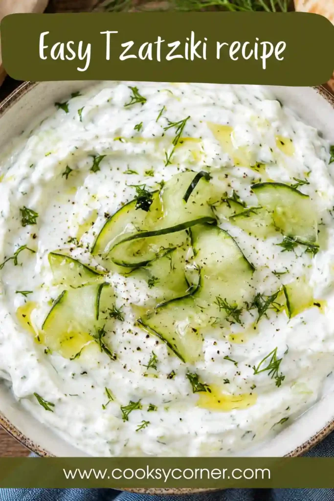 A bowl of creamy homemade Tzatziki made with Greek yogurt, grated cucumber, garlic, lemon juice, and olive oil, garnished with paprika.