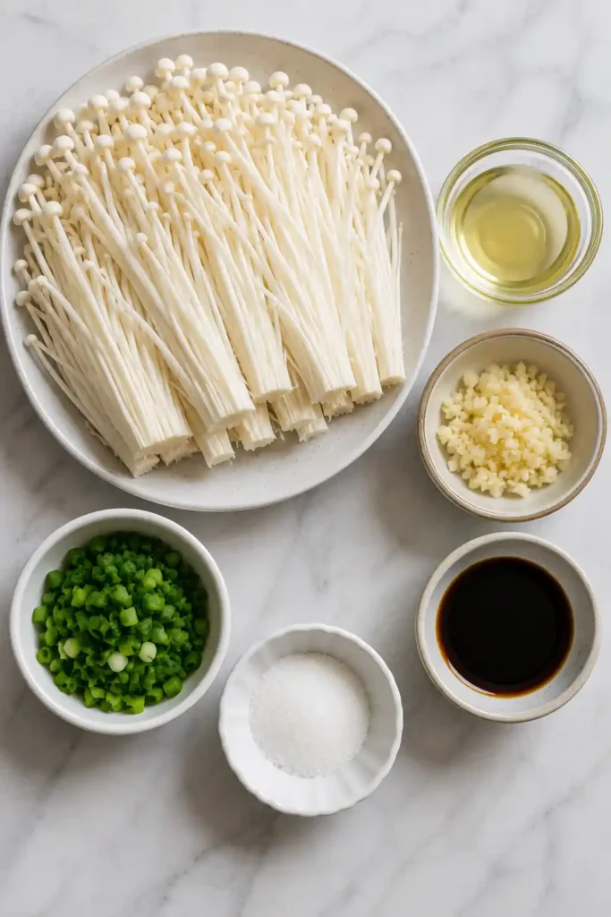Healthy garlic enoki mushrooms served warm with a flavorful scallion sauce.
