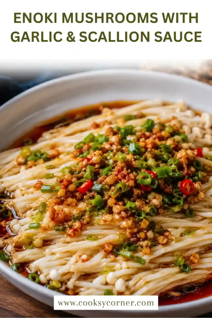 Asian-style enoki mushroom side dish with garlic, soy sauce, and fresh scallions.