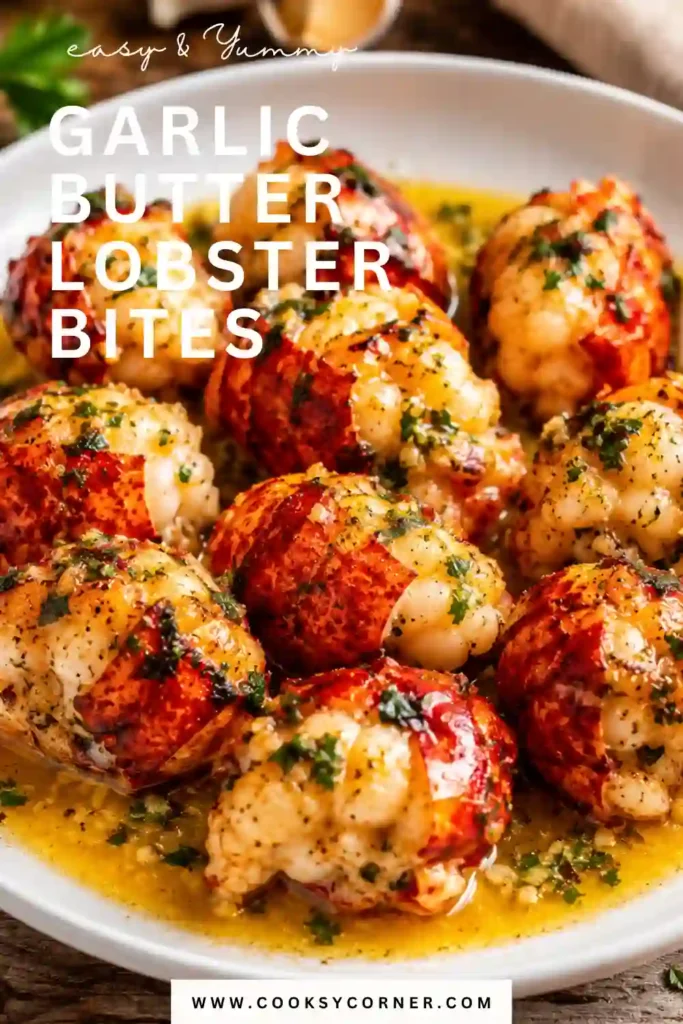 Tender Garlic Butter Lobster Bites served in a skillet with fresh parsley and lemon wedges. The buttery garlic sauce coats each lobster piece, creating an elegant seafood dish perfect for special occasions.