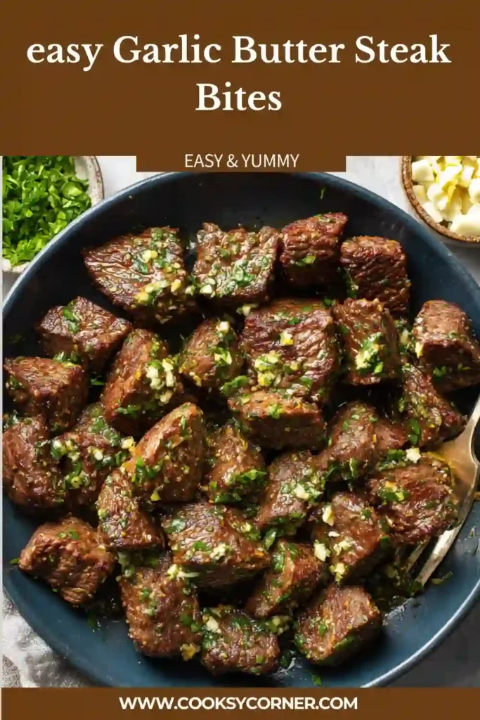 Close-up view of Garlic Butter Steak Bites garnished with green onions and parsley. The steak pieces are browned on the outside and juicy inside.