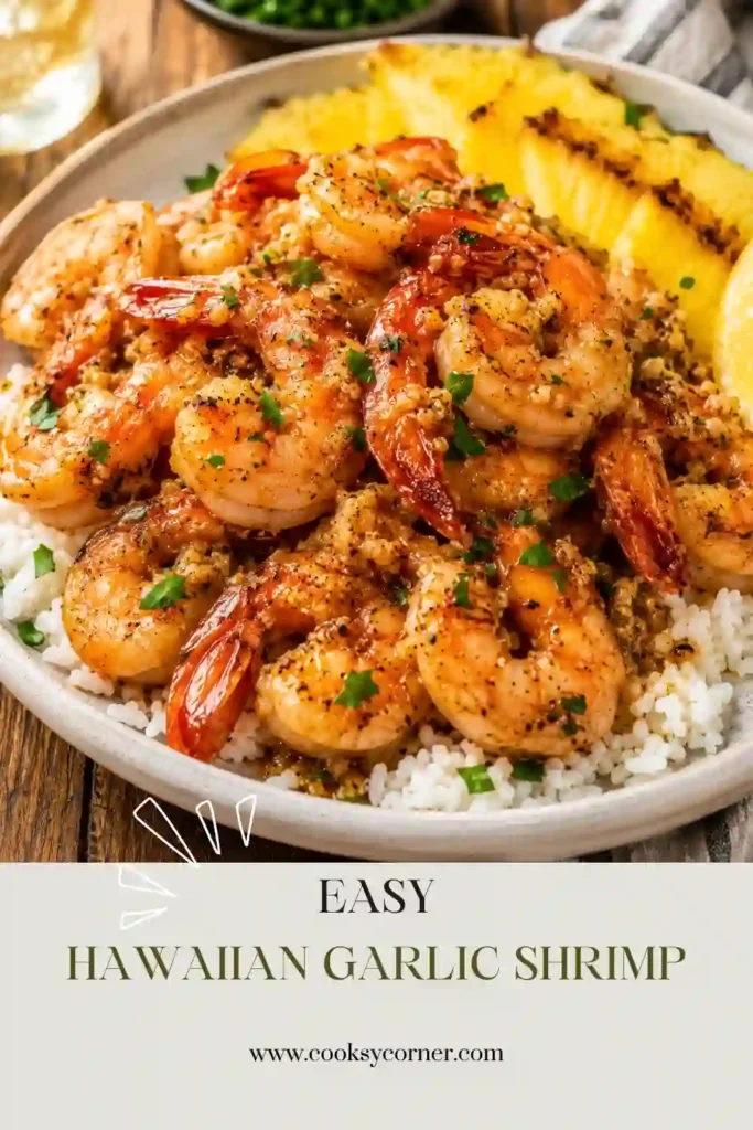 A plate of Hawaiian Garlic Shrimp served with rice and coated in a rich garlic butter sauce. The shrimp are golden, juicy, and garnished with fresh parsley.