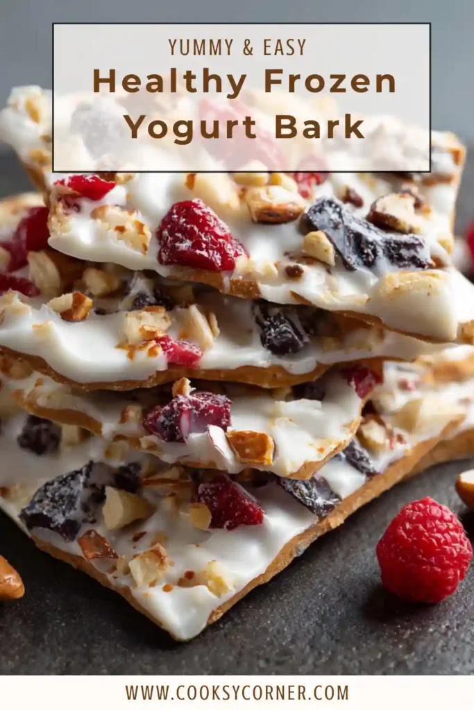 Frozen Yogurt Bark topped with strawberries, blueberries, and granola.