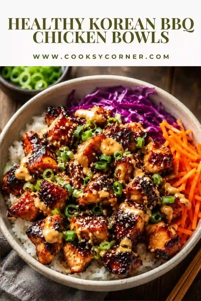 Healthy Korean BBQ Chicken Bowl with marinated chicken, fluffy rice, shredded carrots, cucumbers, and edamame.