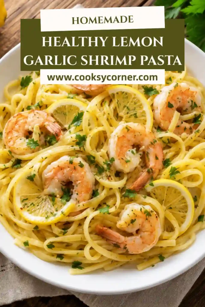 Lemon Garlic Shrimp Pasta served in a bowl with spaghetti, sautéed shrimp, fresh parsley, and lemon slices.