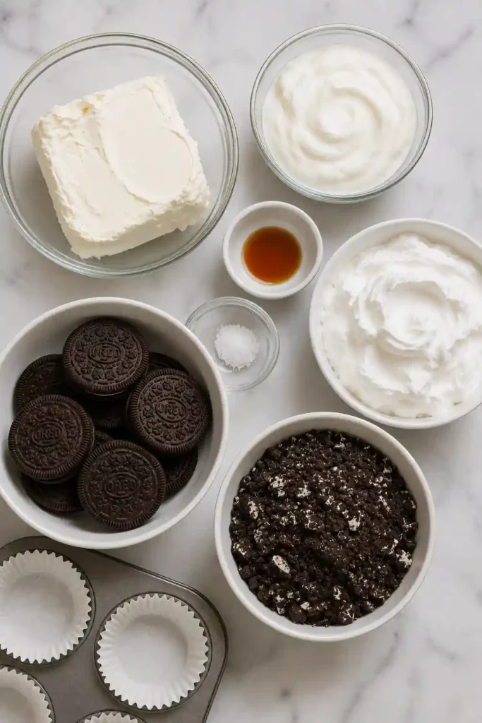 Frozen Oreo cheesecake cups topped with crushed cookies and served chilled.